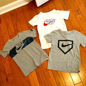 Three NIKE T-shirts. Very gently worn.